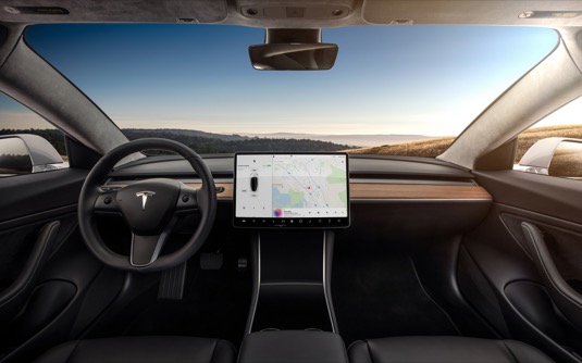 auto elektromobil Tesla Model 3 design interiér minimalismus