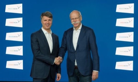 Harald Krüger, předseda představenstva BMW, a Dieter Zetsche, totiž u Daimleru