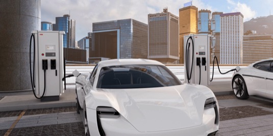 auto elektromobily POrsche Taycan u nabíjecí stanice ABB Terra 184