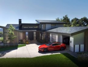 auto elektromobil Tesla modelový rodinný dům